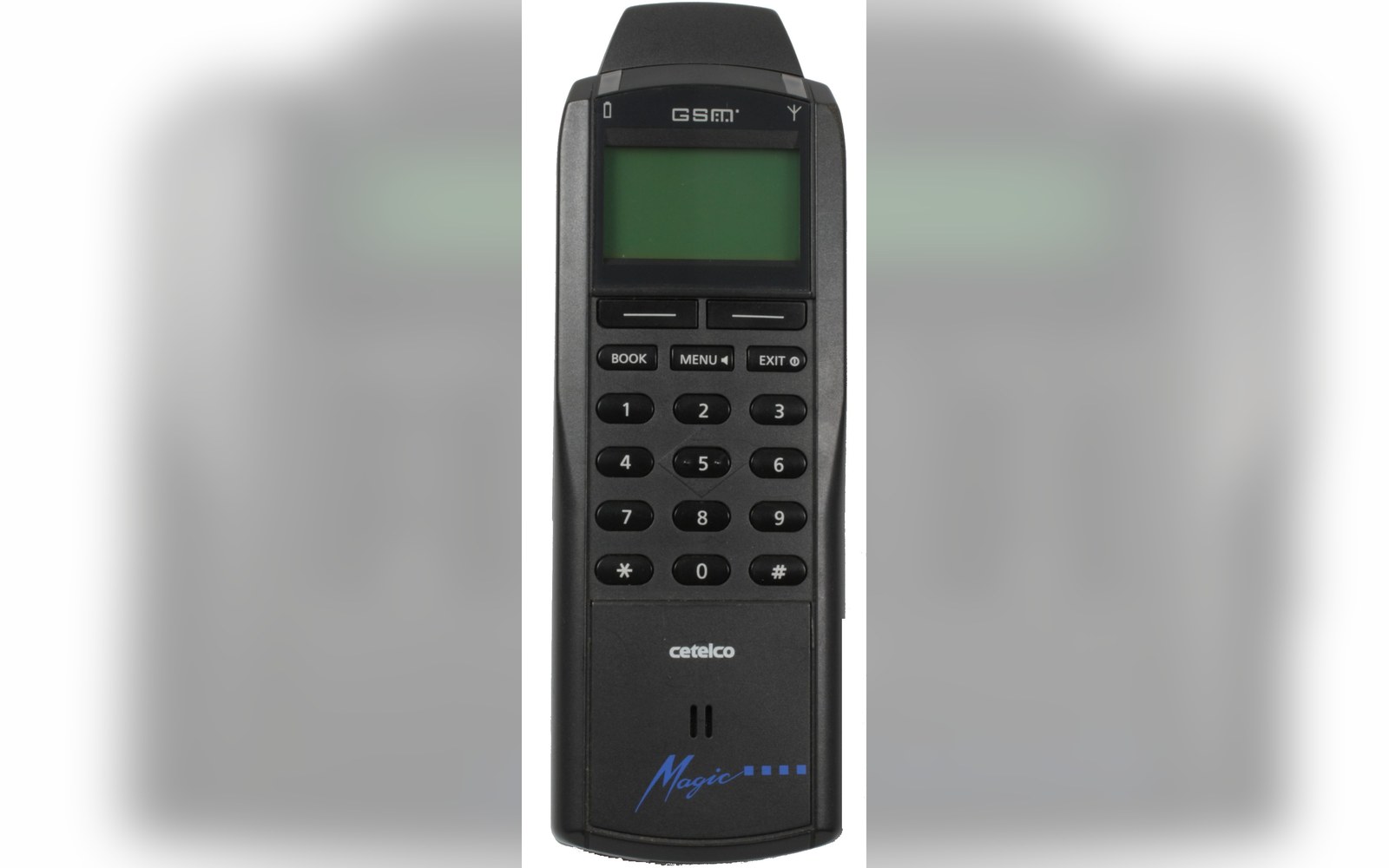 Vintage Cetelco Magic GSM mobile phone with keypad and small green display screen